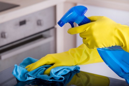 Cleaning technician preparing carpet cleaning equipment before service