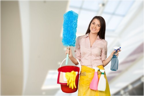 Professional carpet cleaner restoring a living room carpet in SW4