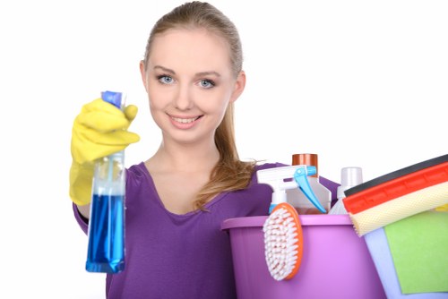 Cleaner keeping a SW4 kitchen and bathroom spotless